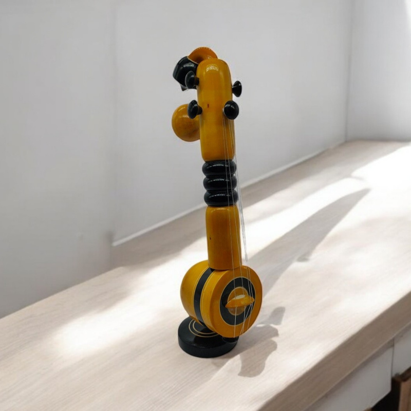 Wooden Veena (5) Handcrafted Wooden Veena – a traditional art piece made by skilled artisans. Perfect for home décor, gifting, and cultural displays, this wooden veena adds an elegant touch of Indian heritage to any space.